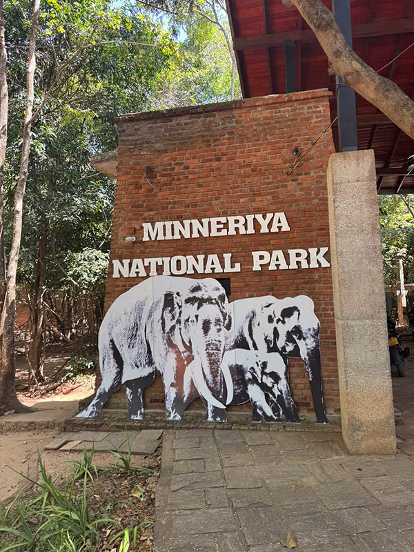 MINNERIYA NATIONAL PARK sign at entrance MINNERIYA NATIONAL PARK sign at entrance