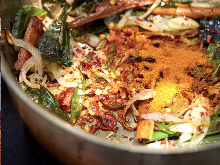 WILD COAST TENTED LODGE bowl of local food spicy